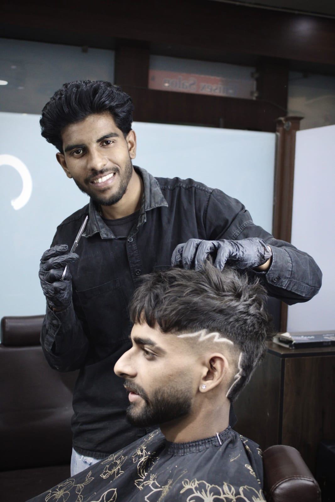 The barber at the chair